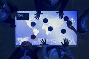 People in a world connection technology meeting having due diligence discussions